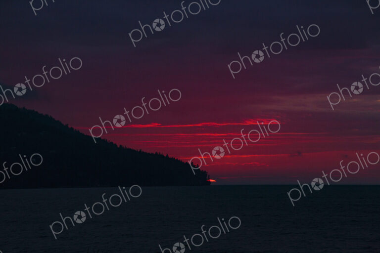 Sun setting over Striped Peak, Port Angeles, WA USA