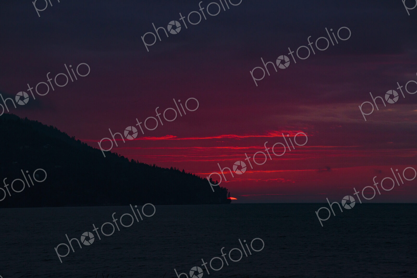 Sun setting over Striped Peak, Port Angeles, WA USA