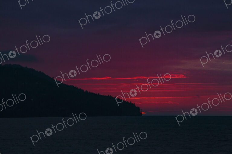 Sun setting over Striped Peak, Port Angeles, WA USA