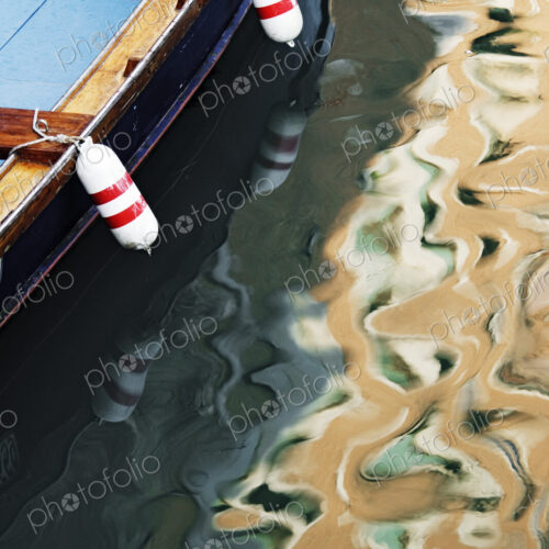 Sunlight and Boat Reflected in Canal Sunlight and Boat Reflected in Canal