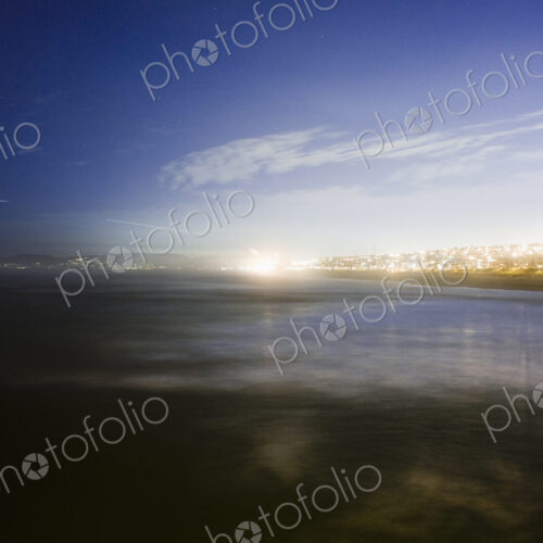 Sunlight on lake in urban area. Sunlight on lake in urban area.