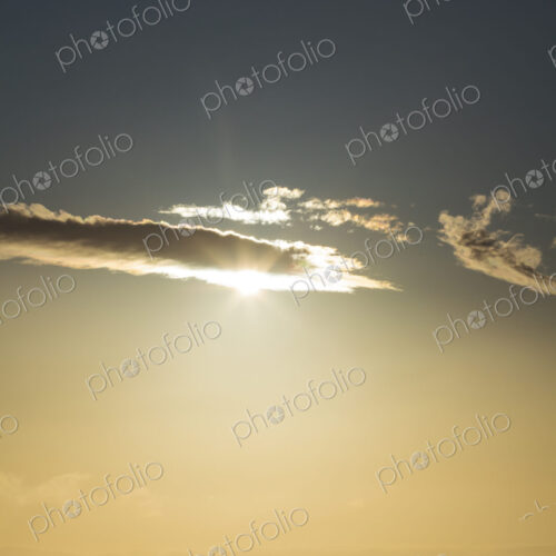 Sunlight over the Strait of Juan de Fuca, lighting up the clouds passing across the sun. Sunlight over the Strait of Juan de Fuca, lighting up the clouds passing across the sun.