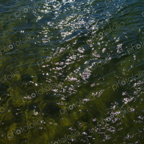 Sunlight relfecting on clear waters of Lake Tahoe, High Sierra, CA, USA Sunlight relfecting on clear waters of Lake Tahoe, High Sierra, CA, USA