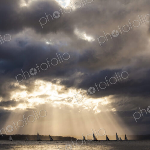 Sunlight streaming though storm clouds, Puget Sound. Sunlight streaming though storm clouds, Puget Sound.