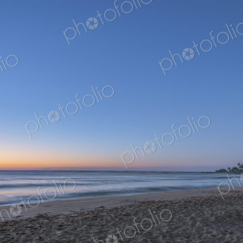 Sunrise over beach and ocean