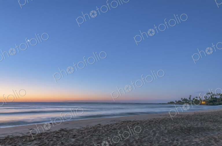 Sunrise over beach and ocean