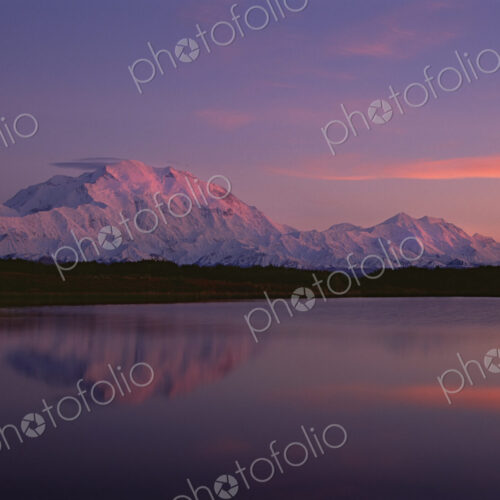 Sunset, Mount McKinley in Denali National Park, Alaska reflected in Reflection Pond.