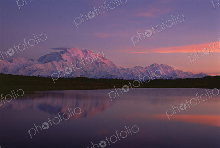 Sunset, Mount McKinley in Denali National Park, Alaska reflected in Reflection Pond.