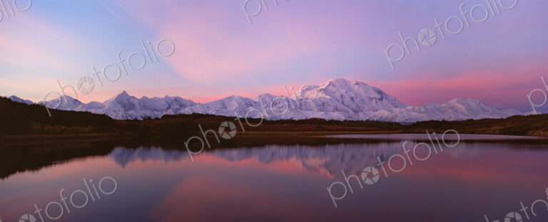 Sunset, Mount McKinley in Denali National Park, Alaska reflected in Reflection Pond.