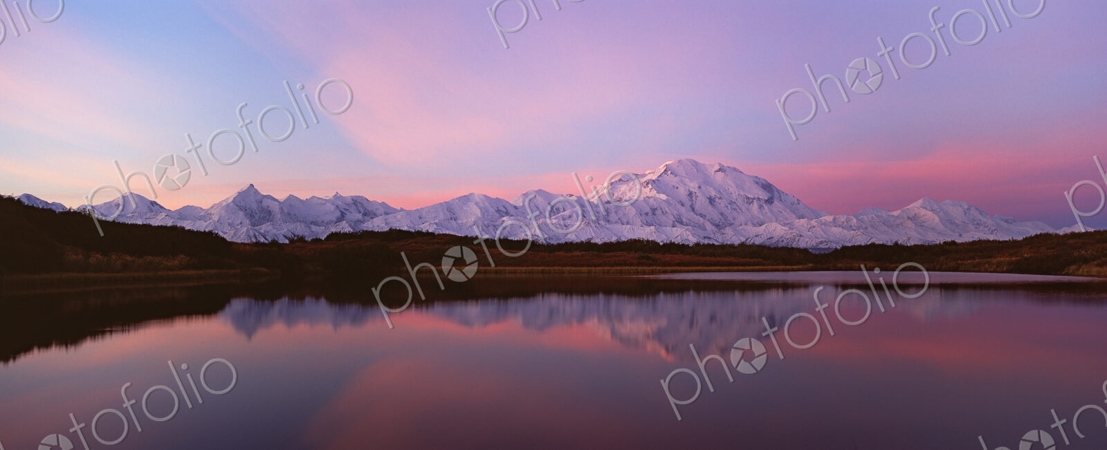 Sunset, Mount McKinley in Denali National Park, Alaska reflected in Reflection Pond.