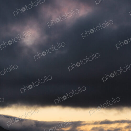 Sunset and dark clouds over the Strait of Juan de Fuca. Sunset and dark clouds over the Strait of Juan de Fuca.
