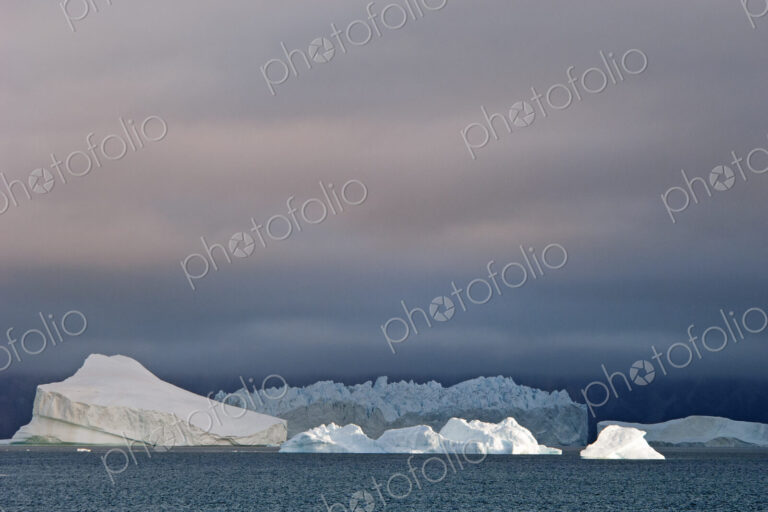 Sunset sky, with heavy cloud and floating icebergs