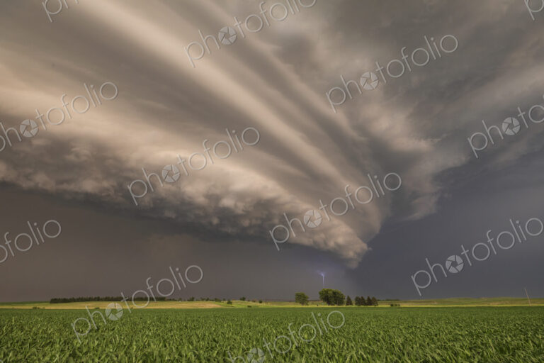Supercell with a Sculpted Base at Sunset