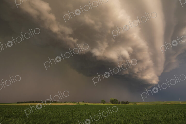 Supercell with a Sculpted Base at Sunset