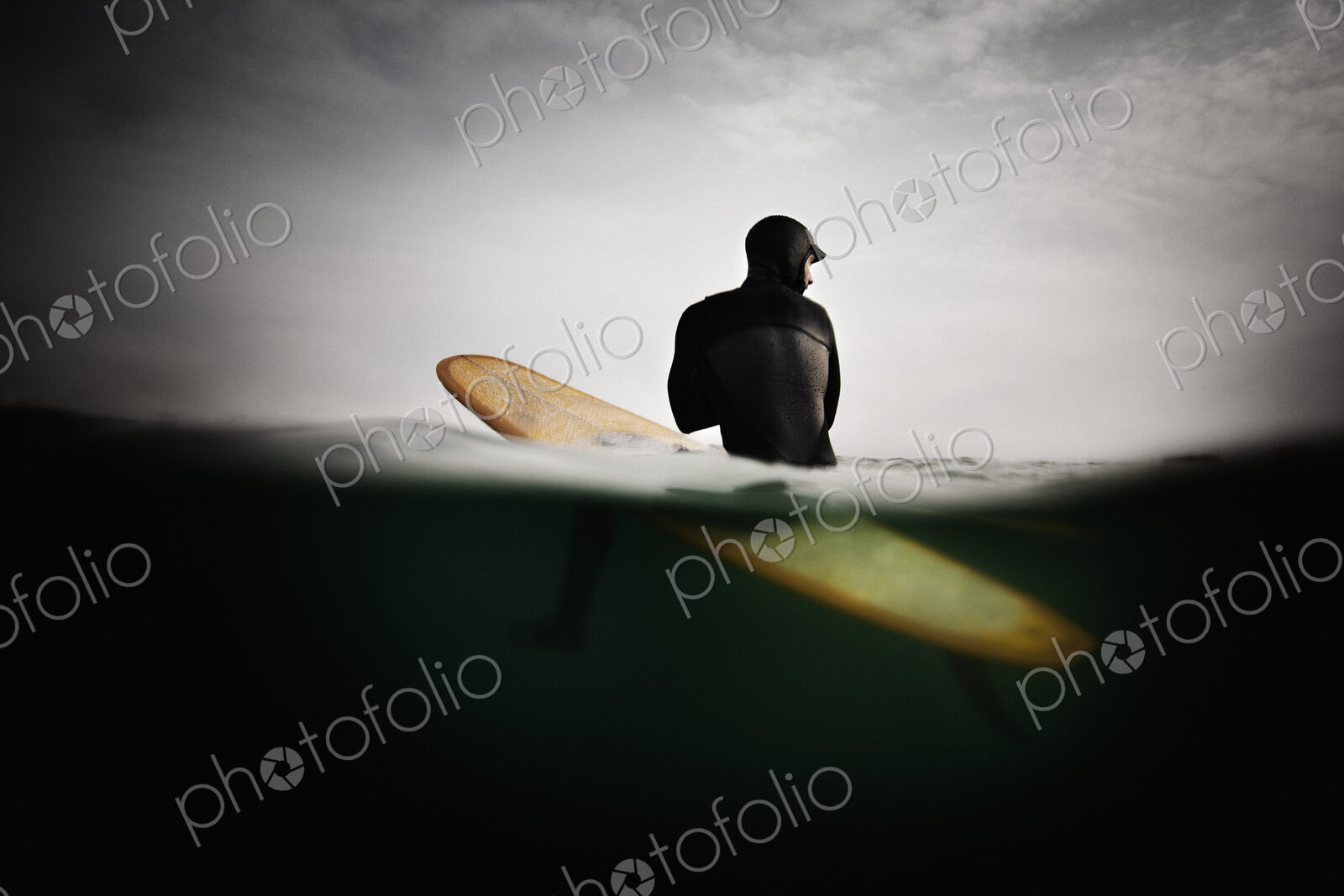 Surfer on Surfboard, Anticipating Wave