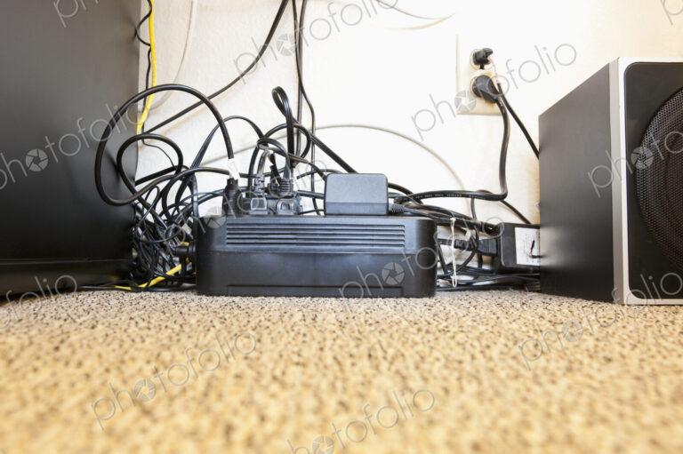 Surge Protector and Many Power Cables