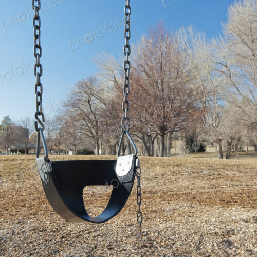 Swing Set on a Grass Field Swing Set on a Grass Field