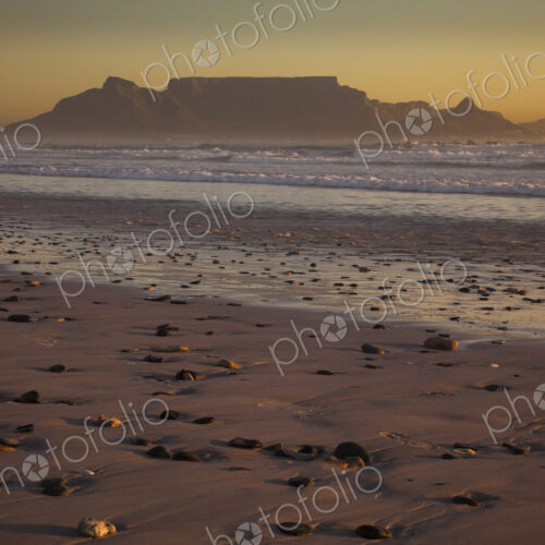 Table Mountain and the outline of Devil's Peak and Lion's Head, viewed from the shores… Table Mountain and the outline of Devil's Peak and Lion's Head, viewed from the shores…