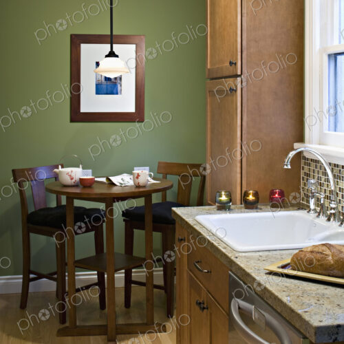 Table and chairs in modern kitchen Table and chairs in modern kitchen