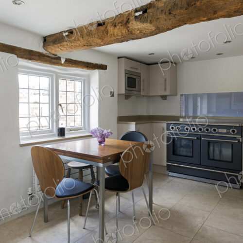 Table and chairs in modern kitchen