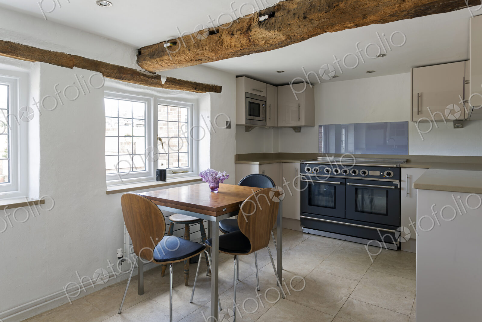 Table and chairs in modern kitchen