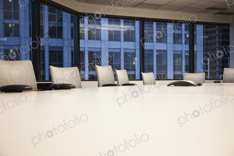 Table and chairs in urban conference room