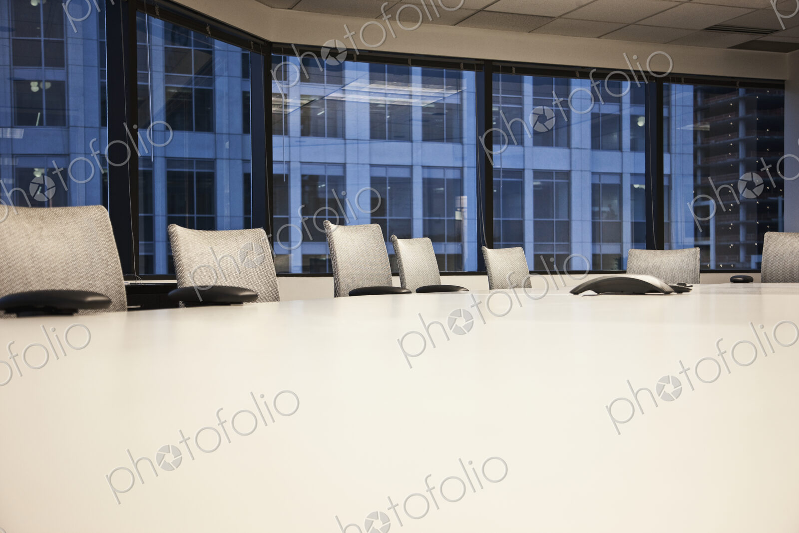 Table and chairs in urban conference room