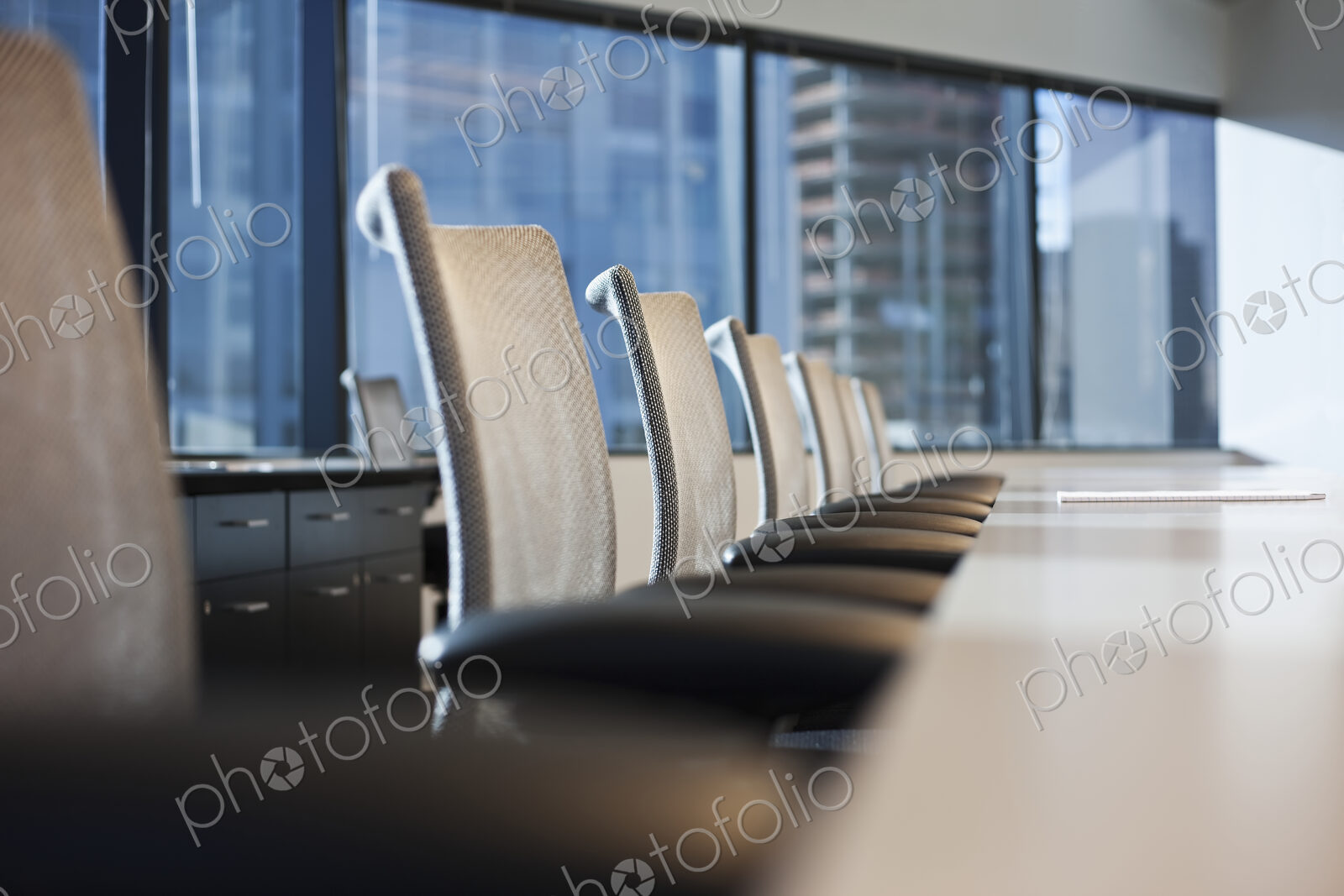 Table and chairs in urban conference room