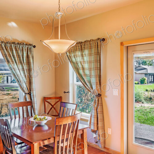 Table and windows in dining room Table and windows in dining room