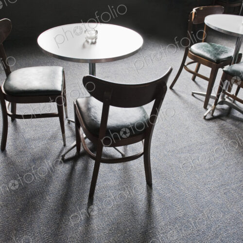Tables and Chairs in a Cafe Tables and Chairs in a Cafe