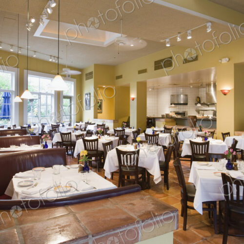 Tables and booths in empty restaurant Tables and booths in empty restaurant