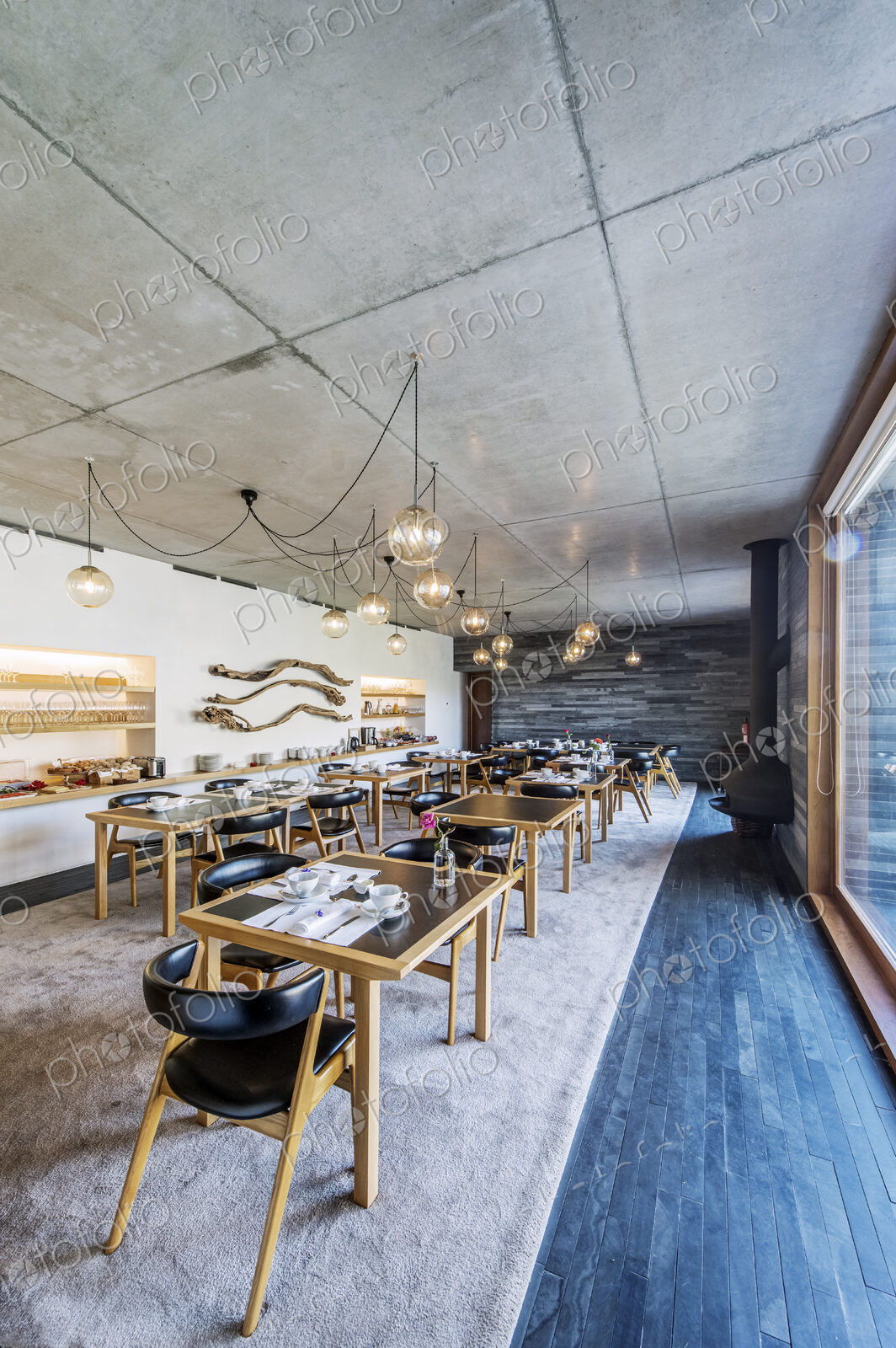 Tables and chairs in modern cafe