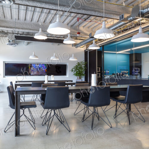 Tables in open office dining area
