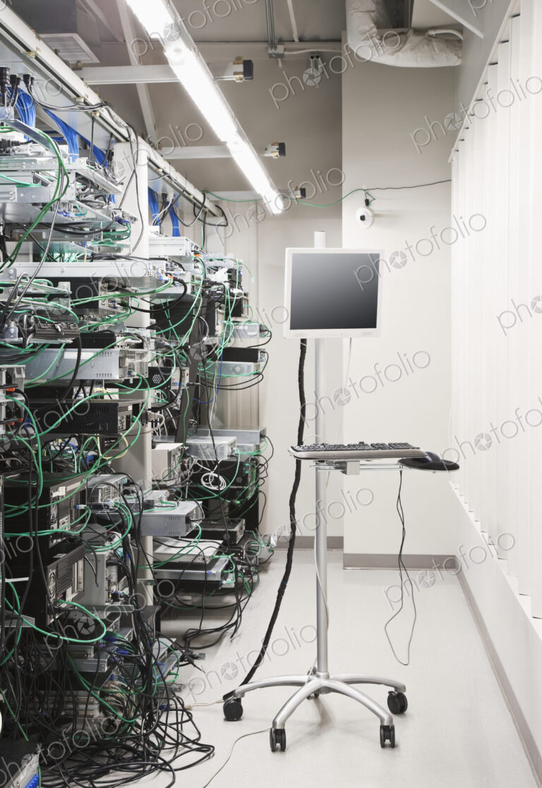 Tangled computer server cords in server room