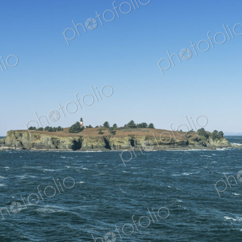 Tatoosh Island, the northwestern tip of the continental United States, a lighthouse.