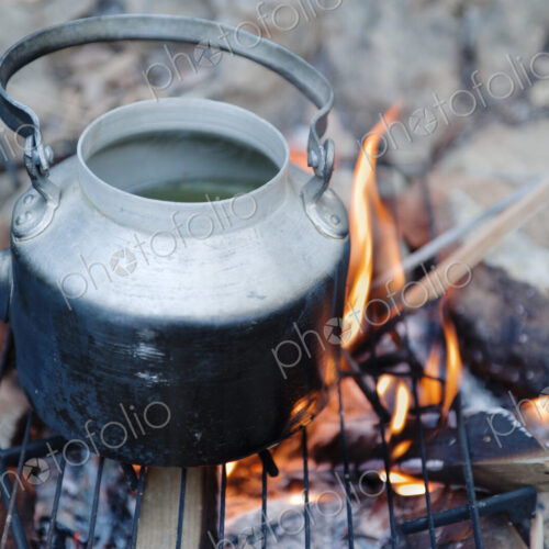 Teapot on campfire Teapot on campfire
