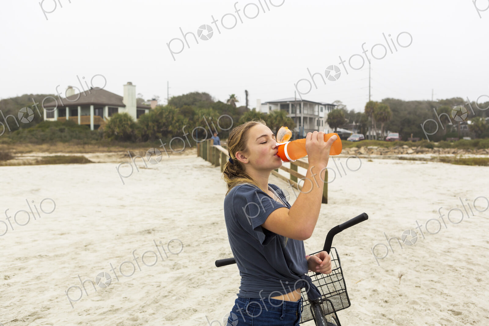Teenage girl drinking water, St. Simon’s Island Georgia