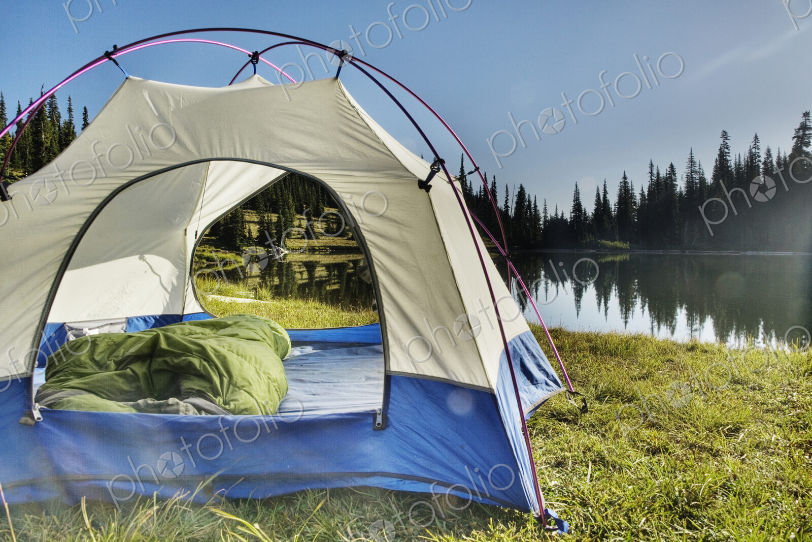 Tent at tranquil lakeside