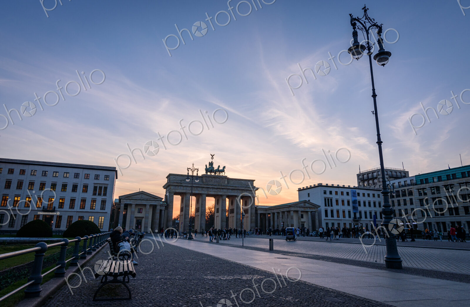 The Brandenburg Gate in Berlin, Germany at sunset.