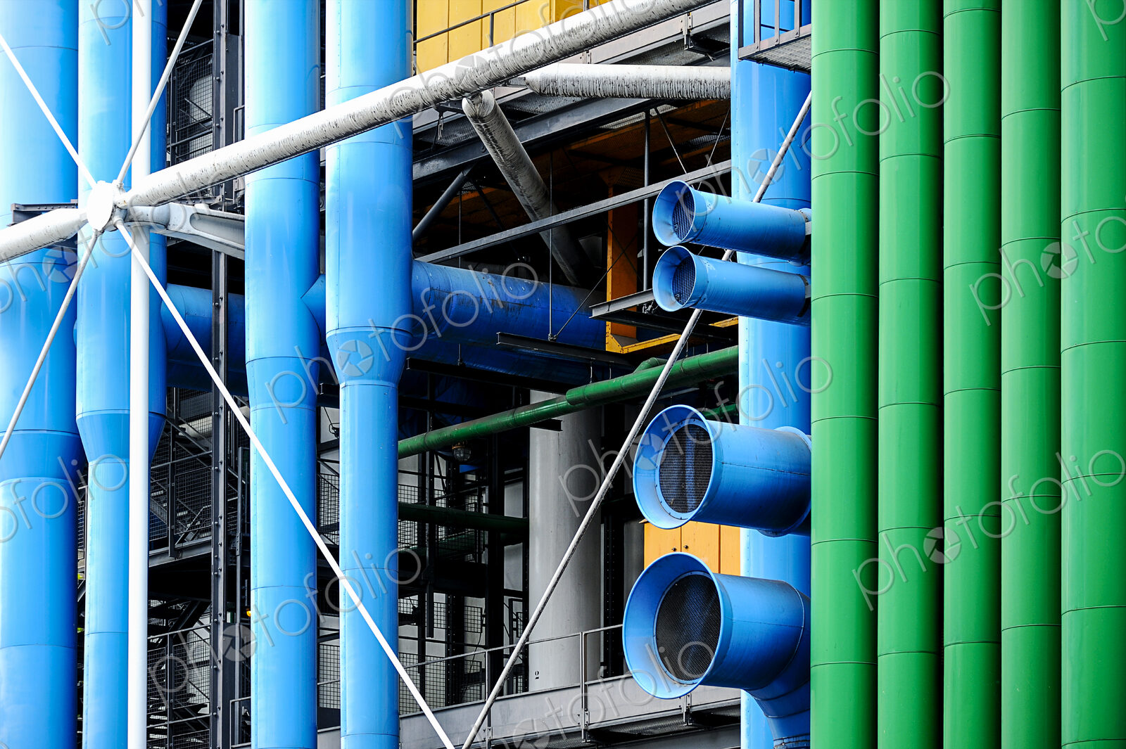 The Centre Pompidou building in Paris, exterior blue and green pipes.