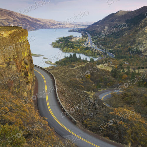 The Columbia River Highway from Rowena Crest, view of a road and lake. The Columbia River Highway from Rowena Crest, view of a road and lake.