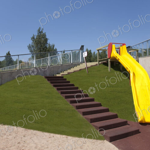 The Estonian Road Museum, open air museum grounds, a large yellow playground slide.