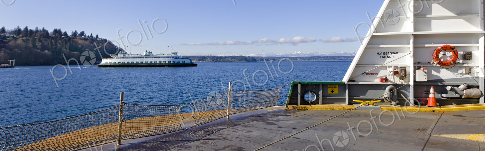 The M.V. Issaquah Ferry boat en route to Vashon Island, offshore on a sunny winter day.