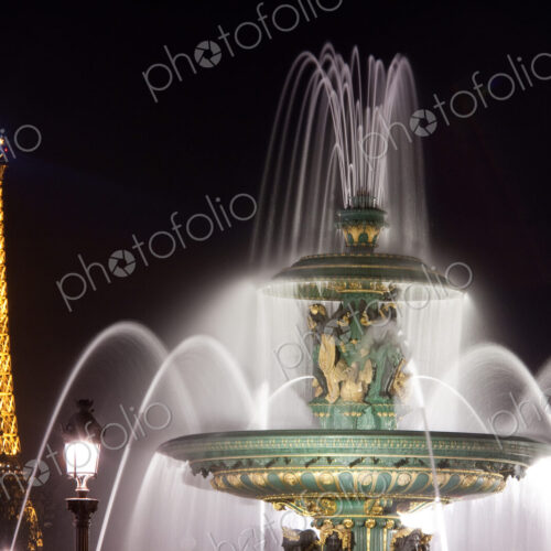 The Maritime Fountain, one of the Fontaines de la Concorde with the Eiffel Tower…