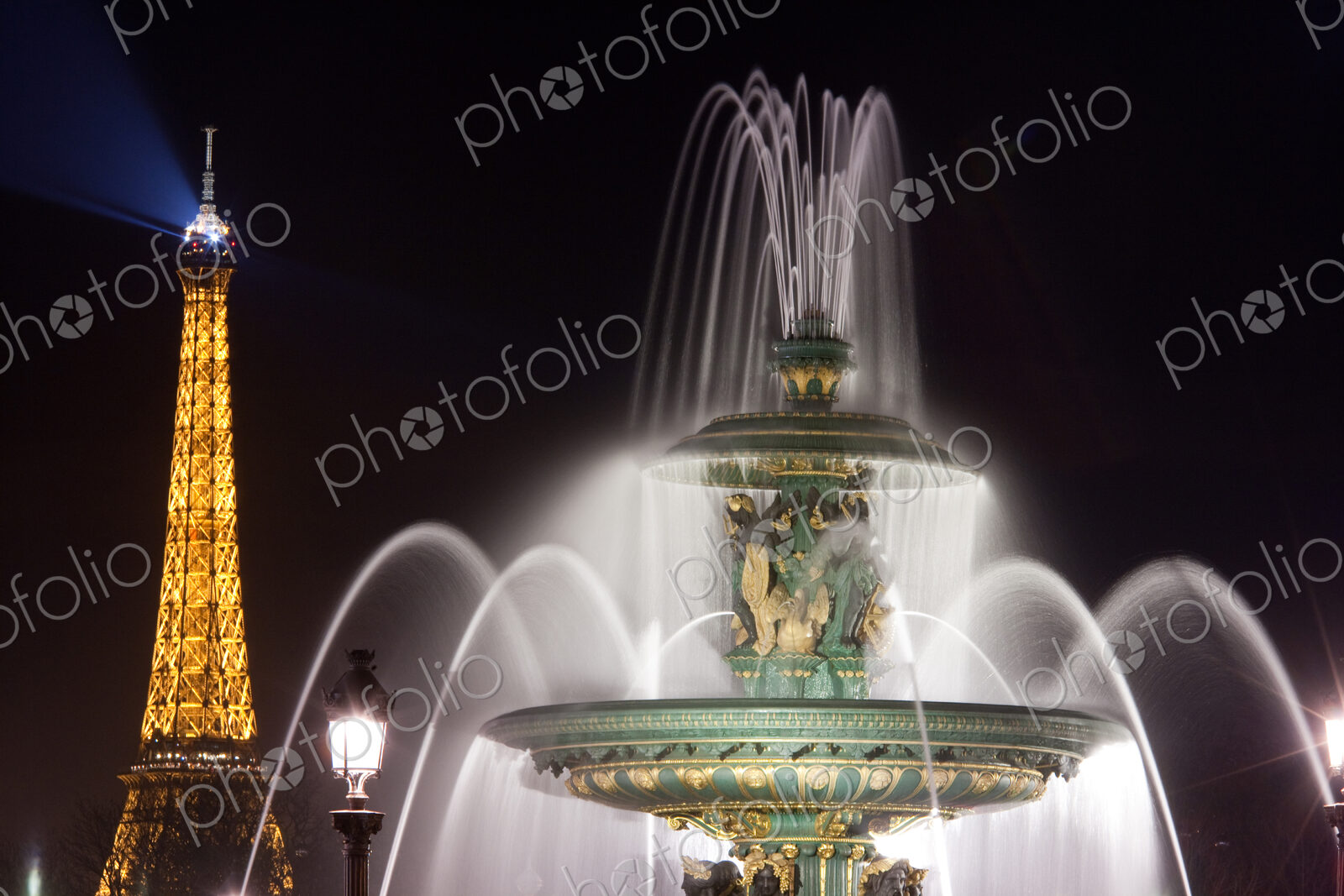 The Maritime Fountain, one of the Fontaines de la Concorde with the Eiffel Tower…