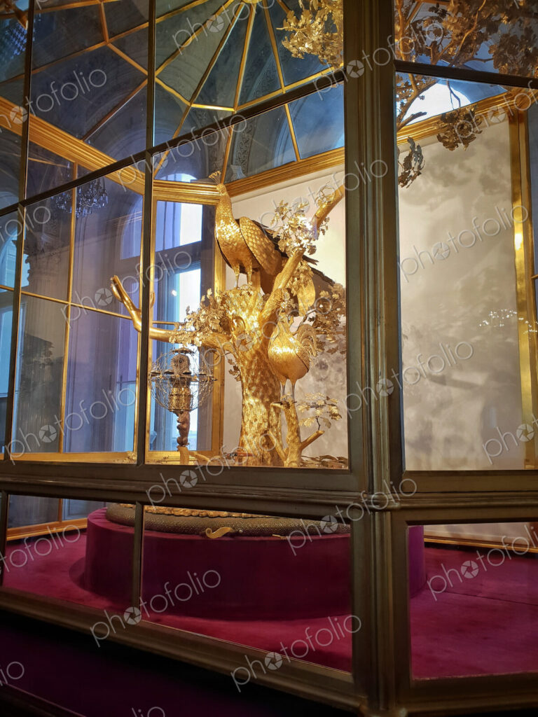The Peacock Clock, a large automaton featuring three life-sized mechanical birds, made…