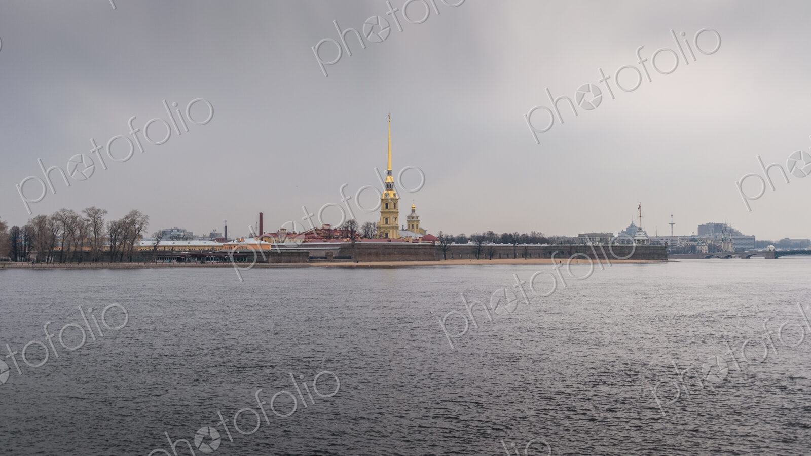 The Peter and Paul Cathedral with a carillon and spire with golden decoration, a…