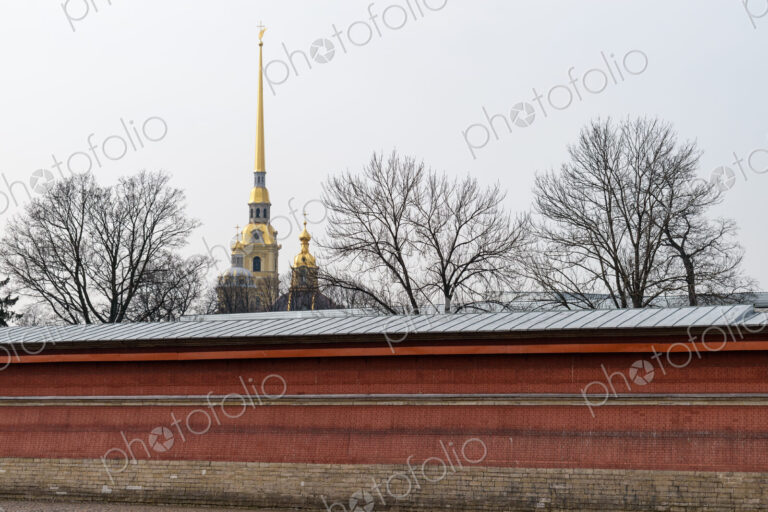The Peter and Paul Cathedral with a carillon and spire with golden decoration, a…