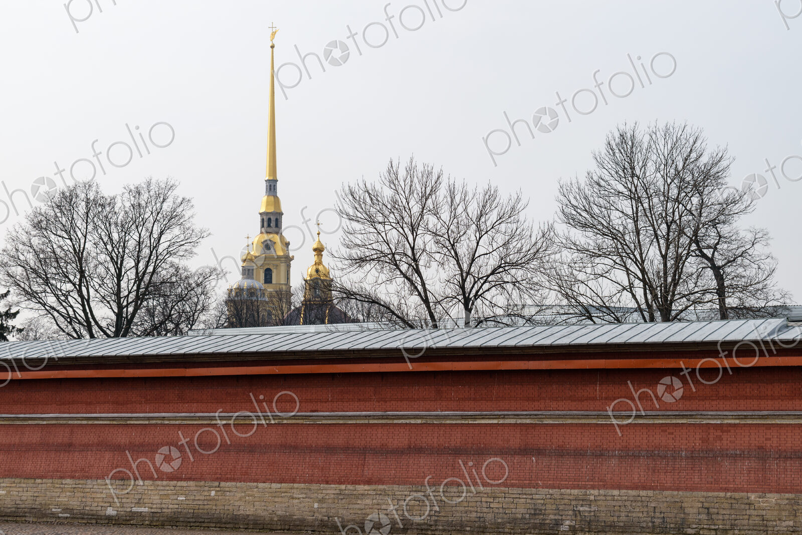 The Peter and Paul Cathedral with a carillon and spire with golden decoration, a…