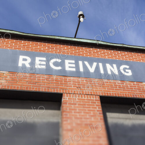 The Receiving loading bay in an industrial building, a warehouse on the dockside at…